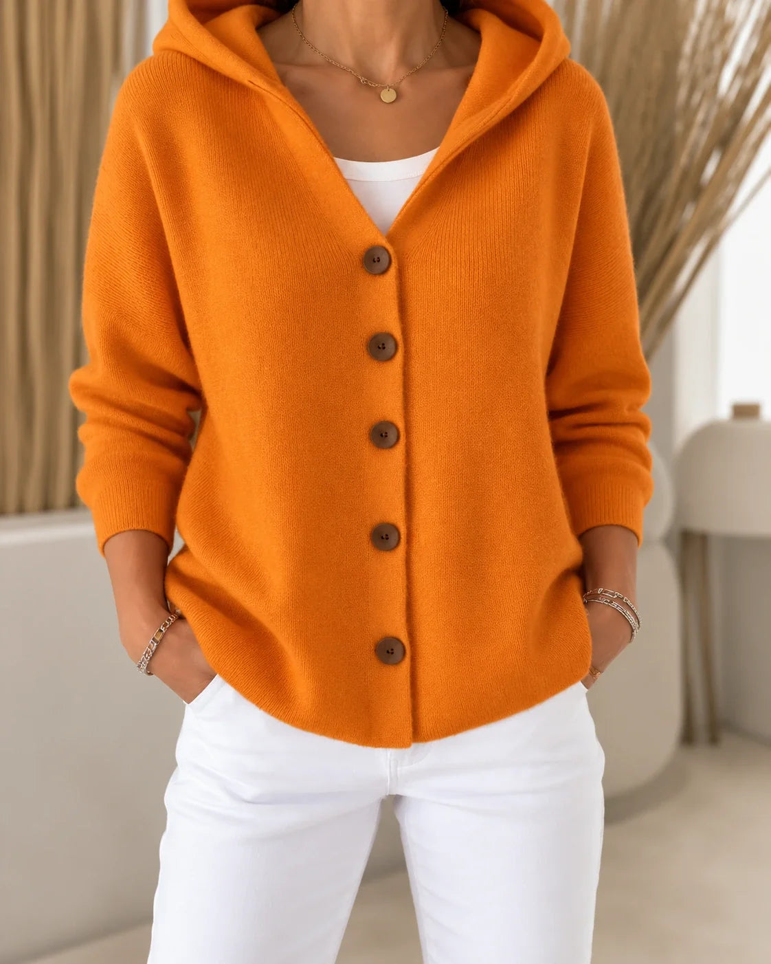Teri | Licht vest met capuchon en knopen