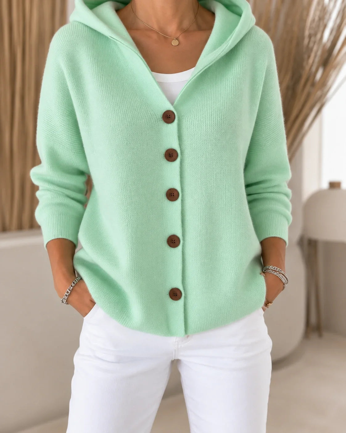Teri | Licht vest met capuchon en knopen